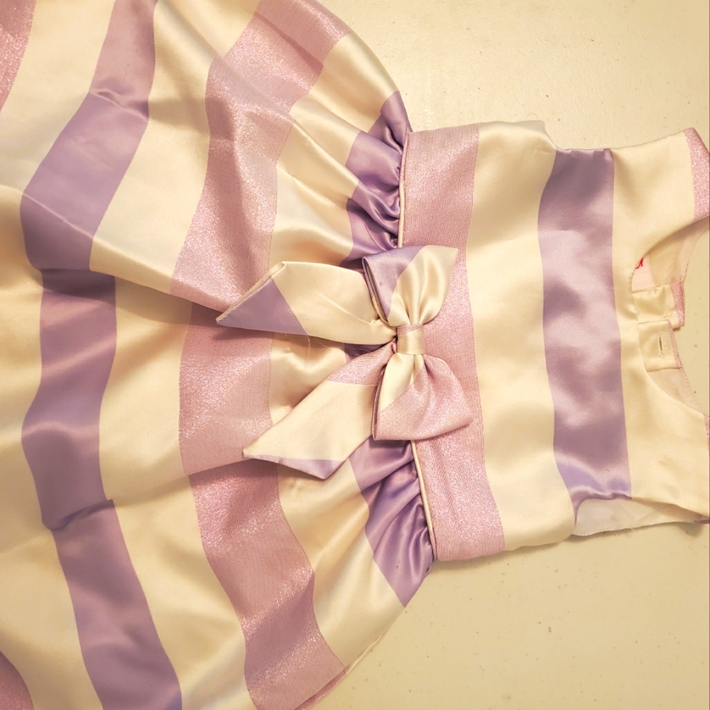 Girl's Formal dress size 4T white/pink/purple. Front bow accent with rear ribbon